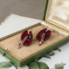 Vintage Matisse Renoir red enamel and copper artist palette earrings with miniature paintbrush design, mid‑century modern clip‑ons from the 1950s–1960s.