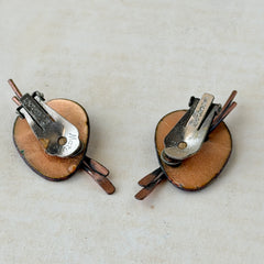 Vintage Matisse Renoir red enamel and copper artist palette earrings with miniature paintbrush design, mid‑century modern clip‑ons from the 1950s–1960s.