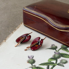 Vintage Matisse Renoir red enamel and copper artist palette earrings with miniature paintbrush design, mid‑century modern clip‑ons from the 1950s–1960s.