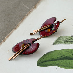 Vintage Matisse Renoir red enamel and copper artist palette earrings with miniature paintbrush design, mid‑century modern clip‑ons from the 1950s–1960s.