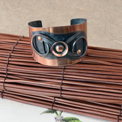 Vintage Modernist copper cuff bracelet with geometric raised design and oxidized black accents, Renoir style, mid‑century Modernist jewelry.