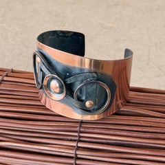 Vintage Modernist copper cuff bracelet with geometric raised design and oxidized black accents, Renoir style, mid‑century Modernist jewelry.