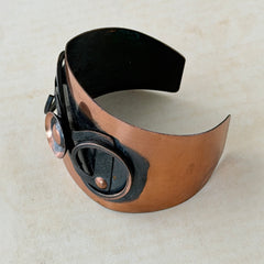 Vintage Modernist copper cuff bracelet with geometric raised design and oxidized black accents, Renoir style, mid‑century Modernist jewelry.