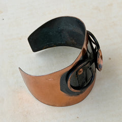 Vintage Modernist copper cuff bracelet with geometric raised design and oxidized black accents, Renoir style, mid‑century Modernist jewelry.