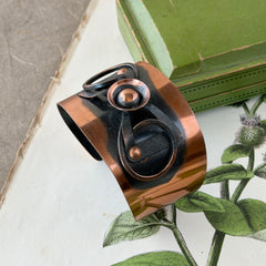 Vintage Modernist copper cuff bracelet with geometric raised design and oxidized black accents, Renoir style, mid‑century Modernist jewelry.