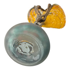 Vintage Romanian art glass vase from the 1990s featuring a frosted teal base, vibrant yellow flared top, and sculptural bronze overlay. Signed by the artist near the base. Elegant and expressive, with subtle surface variation and rich color contrast.