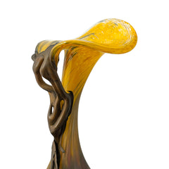 Vintage Romanian art glass vase from the 1990s featuring a frosted teal base, vibrant yellow flared top, and sculptural bronze overlay. Signed by the artist near the base. Elegant and expressive, with subtle surface variation and rich color contrast.