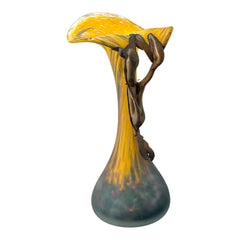Vintage Romanian art glass vase from the 1990s featuring a frosted teal base, vibrant yellow flared top, and sculptural bronze overlay. Signed by the artist near the base. Elegant and expressive, with subtle surface variation and rich color contrast.