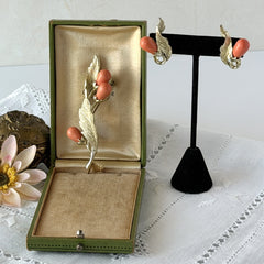 Vintage Sarah Coventry “Bittersweet Berries” brooch and clip‑on earrings set with peach teardrop berries and gold‑tone leaves