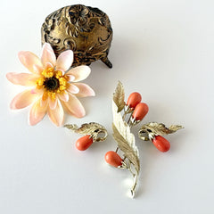 Vintage Sarah Coventry “Bittersweet Berries” brooch and clip‑on earrings set with peach teardrop berries and gold‑tone leaves