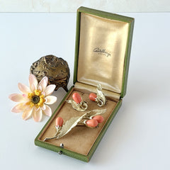 Vintage Sarah Coventry “Bittersweet Berries” brooch and clip‑on earrings set with peach teardrop berries and gold‑tone leaves