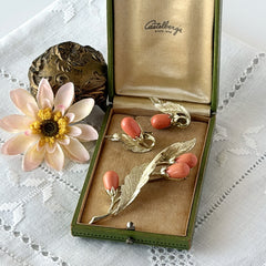 Vintage Sarah Coventry “Bittersweet Berries” brooch and clip‑on earrings set with peach teardrop berries and gold‑tone leaves