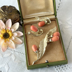 Vintage Sarah Coventry “Bittersweet Berries” brooch and clip‑on earrings set with peach teardrop berries and gold‑tone leaves