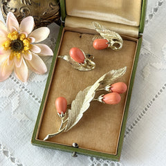 Vintage Sarah Coventry “Bittersweet Berries” brooch and clip‑on earrings set with peach teardrop berries and gold‑tone leaves