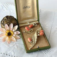 Vintage Sarah Coventry “Bittersweet Berries” brooch and clip‑on earrings set with peach teardrop berries and gold‑tone leaves