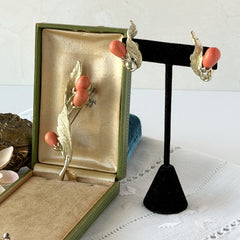 Vintage Sarah Coventry “Bittersweet Berries” brooch and clip‑on earrings set with peach teardrop berries and gold‑tone leaves