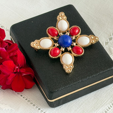 Vintage Sarah Coventry 1972 Americana Maltese cross brooch with red, white and blue cabochons in gold tone