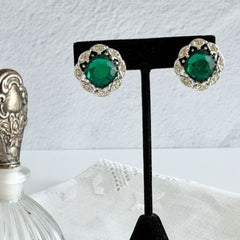 Vintage Sarah Coventry Kathleen emerald and clear rhinestone floral clip‑on earrings, silver‑tone setting.