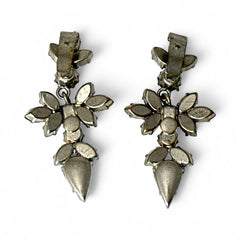 Vintage Schoffel Austria dangle earrings featuring blue, purple, and aurora borealis crystals in silver-tone settings, with floral and teardrop motifs, shown from multiple angles to highlight sparkle, craftsmanship, and signed crown mark.