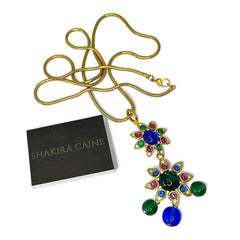 Vintage Shakira Caine Mughal‑style pendant necklace with multicolor glass cabochons, gold tone snake chain, signed and in excellent condition.