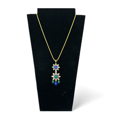 Vintage Shakira Caine Mughal‑style pendant necklace with multicolor glass cabochons, gold tone snake chain, signed and in excellent condition.