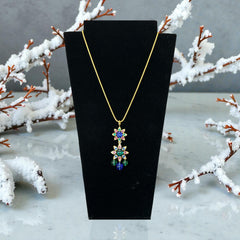 Vintage Shakira Caine Mughal‑style pendant necklace with multicolor glass cabochons, gold tone snake chain, signed and in excellent condition.