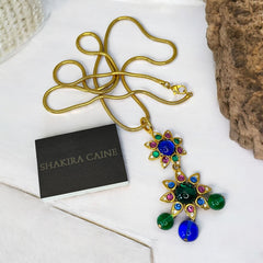 Vintage Shakira Caine Mughal‑style pendant necklace with multicolor glass cabochons, gold tone snake chain, signed and in excellent condition.