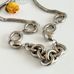 Vintage silver‑tone necklace with snake‑coil links and silver beads, long 36‑inch chain