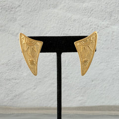 Vintage JJ Jonette 1986 gold‑tone sun and star geometric earrings on original card, textured metal, NOS condition.