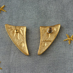 Vintage JJ Jonette 1986 gold‑tone sun and star geometric earrings on original card, textured metal, NOS condition.