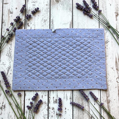 Quilted cotton placemat in gray and pink with Provençal floral pattern, handcrafted in France by Tissus Toselli.
