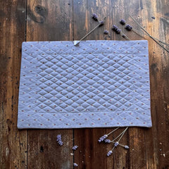 Quilted cotton placemat in gray and pink with Provençal floral pattern, handcrafted in France by Tissus Toselli.