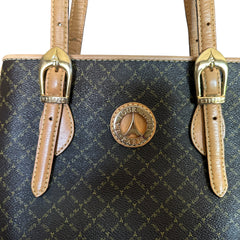 Preloved La Tour Eiffel Paris 1887 brown and tan leather shoulder bag with gold-tone hardware, adjustable handles, and signature logo detailing—elegant bucket silhouette.