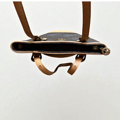 Preloved La Tour Eiffel Paris 1887 brown and tan leather shoulder bag with gold-tone hardware, adjustable handles, and signature logo detailing—elegant bucket silhouette.