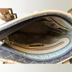 Preloved La Tour Eiffel Paris 1887 brown and tan leather shoulder bag with gold-tone hardware, adjustable handles, and signature logo detailing—elegant bucket silhouette.