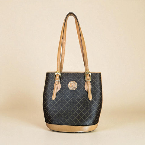 Preloved La Tour Eiffel Paris 1887 brown and tan leather shoulder bag with gold-tone hardware, adjustable handles, and signature logo detailing—elegant bucket silhouette.