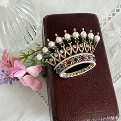 Vintage 1945 Trifari sterling crown brooch designed by Alfred Philippe, featuring restored AAA natural pearls, multicolor vintage rhinestones, and the original Trifari crown Sterling Pat. Pend 140779 markings, shown from various angles to display details, condition, and craftsmanship.