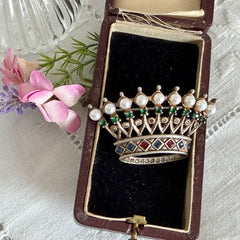 Vintage 1945 Trifari sterling crown brooch designed by Alfred Philippe, featuring restored AAA natural pearls, multicolor vintage rhinestones, and the original Trifari crown Sterling Pat. Pend 140779 markings, shown from various angles to display details, condition, and craftsmanship.