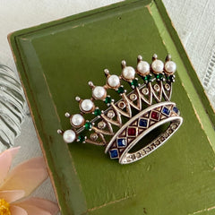 Vintage 1945 Trifari sterling crown brooch designed by Alfred Philippe, featuring restored AAA natural pearls, multicolor vintage rhinestones, and the original Trifari crown Sterling Pat. Pend 140779 markings, shown from various angles to display details, condition, and craftsmanship.