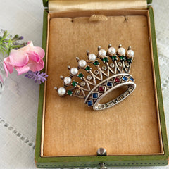 Vintage 1945 Trifari sterling crown brooch designed by Alfred Philippe, featuring restored AAA natural pearls, multicolor vintage rhinestones, and the original Trifari crown Sterling Pat. Pend 140779 markings, shown from various angles to display details, condition, and craftsmanship.