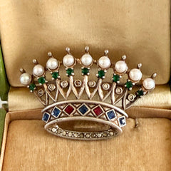 Vintage 1945 Trifari sterling crown brooch designed by Alfred Philippe, featuring restored AAA natural pearls, multicolor vintage rhinestones, and the original Trifari crown Sterling Pat. Pend 140779 markings, shown from various angles to display details, condition, and craftsmanship.