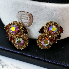 Vintage 1950s Trifari Crown clip‑on earrings with AB topaz rhinestones and gold‑tone floral design