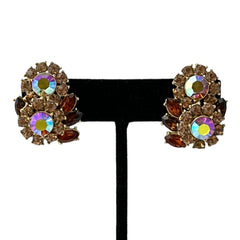 Vintage 1950s Trifari Crown clip‑on earrings with AB topaz rhinestones and gold‑tone floral design