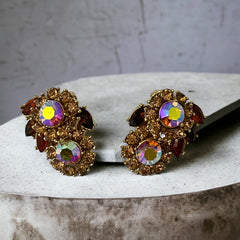 Vintage 1950s Trifari Crown clip‑on earrings with AB topaz rhinestones and gold‑tone floral design