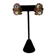 Vintage 1950s Trifari Crown clip‑on earrings with AB topaz rhinestones and gold‑tone floral design
