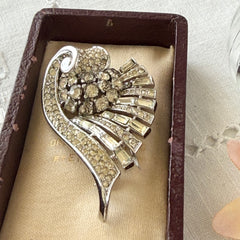 Vintage Trifari Crown Alfred Philippe 1950 rhodium‑plated brooch with pave and baguette rhinestones.