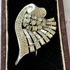 Vintage Trifari Crown Alfred Philippe 1950 rhodium‑plated brooch with pave and baguette rhinestones.