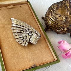 Vintage Trifari Crown Alfred Philippe 1950 rhodium‑plated brooch with pave and baguette rhinestones.