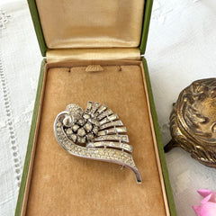 Vintage Trifari Crown Alfred Philippe 1950 rhodium‑plated brooch with pave and baguette rhinestones.