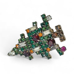 Vintage 1950s Christmas tree brooch with green, red, amber, and clear rhinestones in a gold tone setting, featuring five candle-like stones and a teardrop topper; unsigned Weiss style, very good condition.